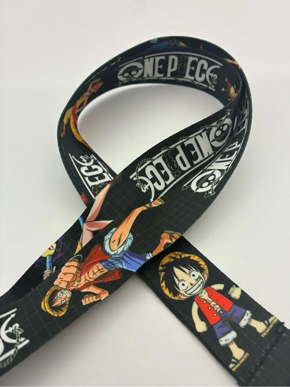 Onepiece Black Anime Character Lanyard with Yellow and Red Accents